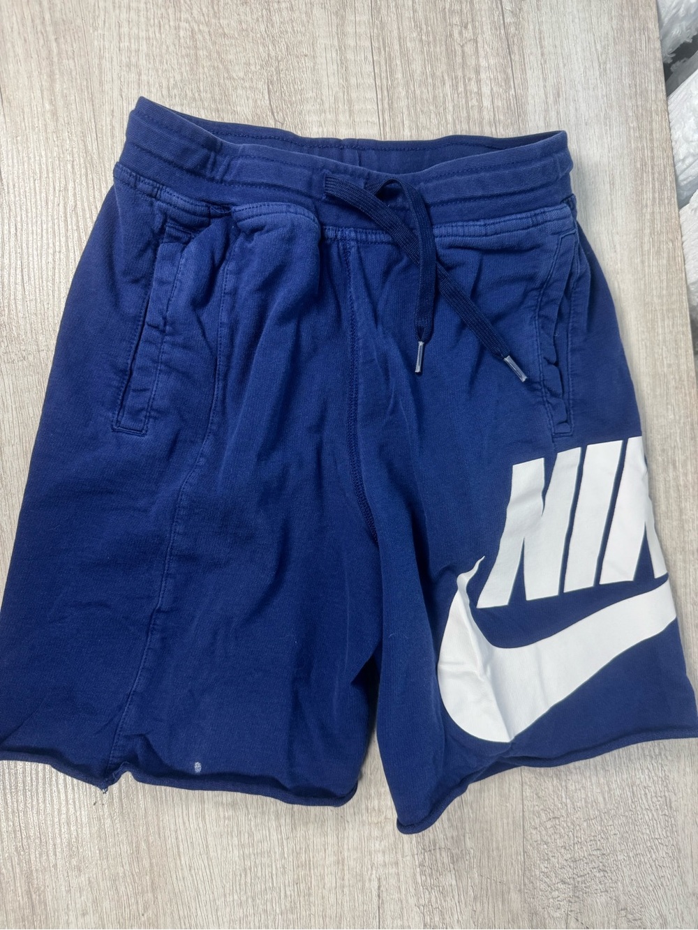 Nike Navy Blue Kids Athletic Shorts with White Swoosh